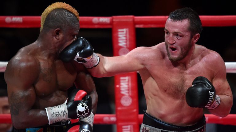 Russia's boxer Denis Lebedev (R) vies France's boxer Youri Kayembre Kalenga during their WBA Cruiserweight title fight in Moscow late on April 10, 2015. AF