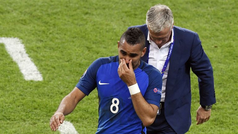France's forward Dimitri Payet (L) reacts next to France's coach Didier Deschamps after scoring the 2-1 goal during the Euro 2016 group A football match be