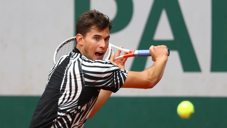 Dominic Thiem of Austria hits a backhand during the Men's Singles fourth round match against Marcel Granollers