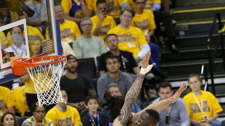 OAKLAND, CA - MAY 18: Draymond Green #23 of the Golden State Warriors goes for the layup during the game against Steven Adams #12 of the Oklahoma City Thun