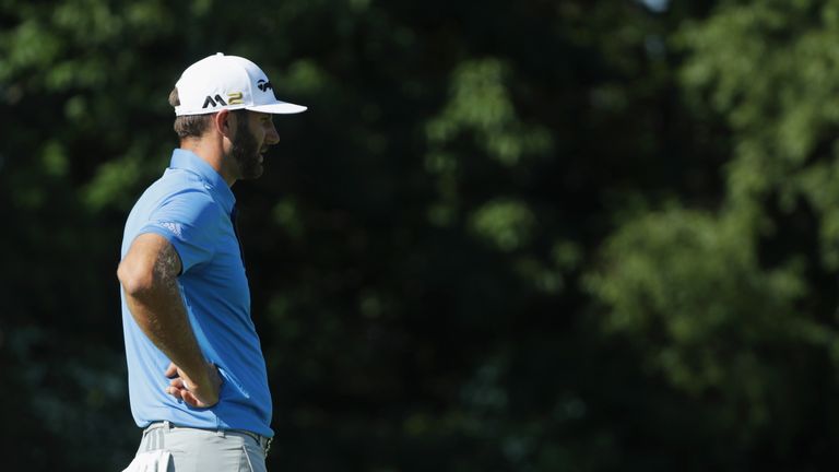 Dustin Johnson of the United States waits to putt on the 16th hole during the second round of the U.S. Open at Oakmont Country Club