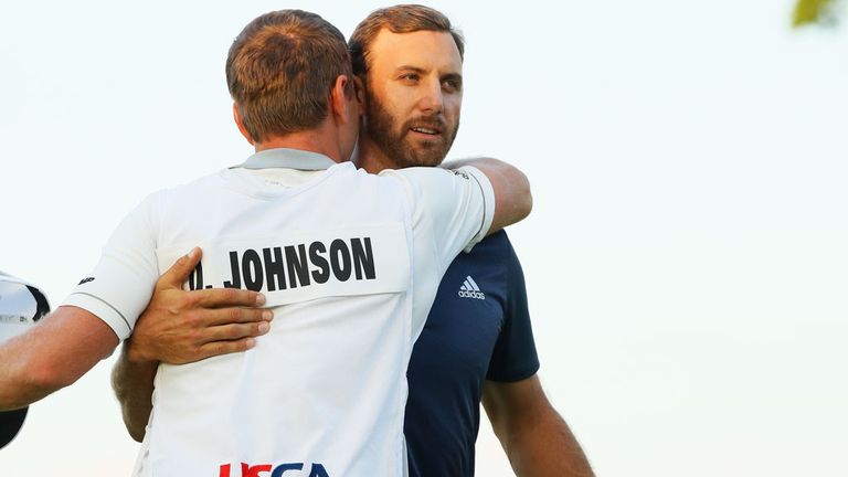 Dustin Johnson celebrates his US Open success with his brother and caddie Austin