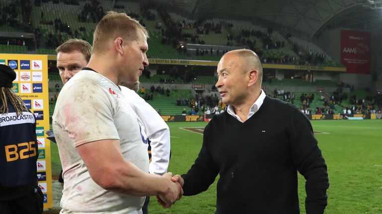 Eddie Jones, the England head coach, shakes hands with team captain Dylan Hartley after their victory against Australia in Melbourne