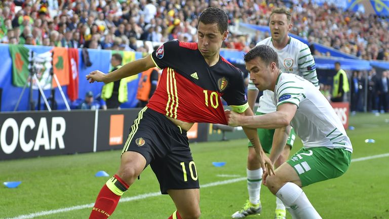 Belgium's forward Eden Hazard (L) challenges Ireland's defender Seamus Coleman during the Euro 2016 group E football match between Belgium and Ireland at t