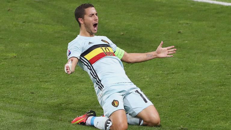 Eden Hazard of Belgium slides on his knees