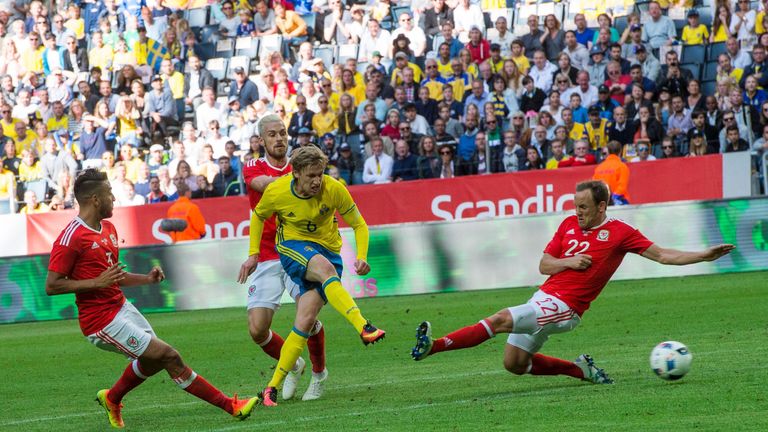 Sweden's midfielder Emil Forsberg shoots to score against Wales