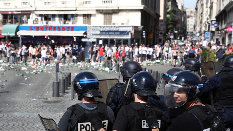 England fans clash with police ahead of the game against Russia later on June 11, 2016 in Marseille, France
