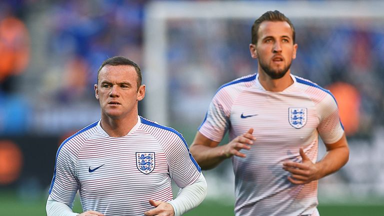 England's forward Wayne Rooney (L) and England's forward Harry Kane warm up  prior to the  Euro 2016 round of 16 football match between England and Iceland