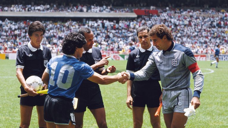 Maradona shakes hands with England captain Peter Shilton before kick-off