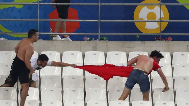 Fans clash after the match between England and Russia at Stade Velodrome