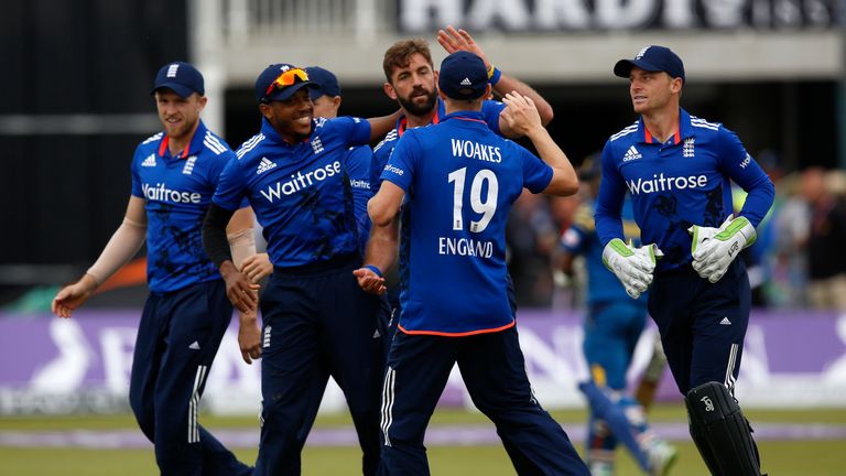 BRISTOL, ENGLAND - JUNE 26: Liam Plunkett (c) of England is congratulated by team mates after the wicket of Seekuge Prasanna of Sri Lanka during The 3rd OD