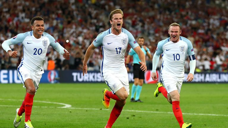 Eric Dier (C) of England celebrates scoring his team's first goal with his team mates during the UEFA EURO 2016 Group B match
