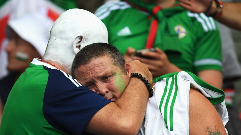 Northern Ireland supporters are left dejected after their elimination