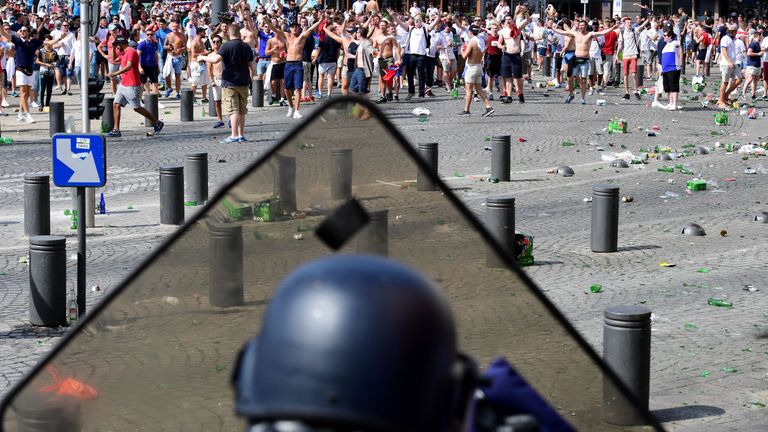 England fans clash with police personnel as England fans gather in the city of Marseille, southern France, on June 11, 2016