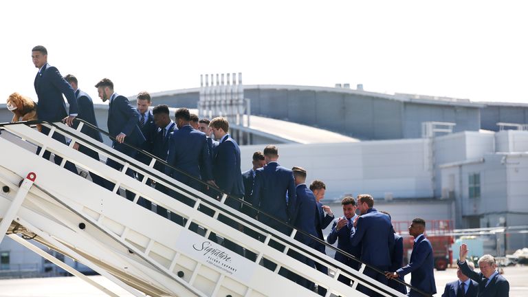 England manager Roy Hodgson (right) waves as the team board the plane at Luton Airport.