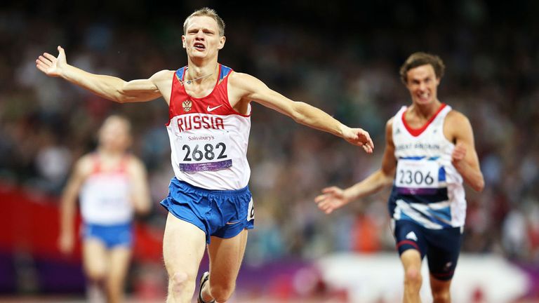 Evgenii Shvetcov of Russia crosses the line to win gold in the Men's 400m in 2012