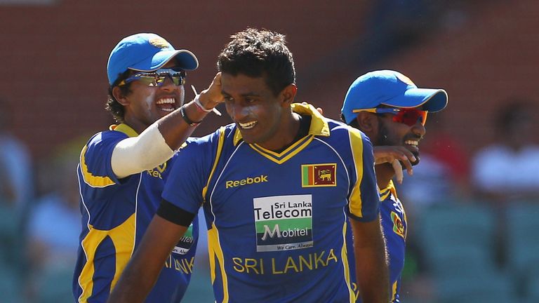 Farveez Maharoof of Sri Lanka (centre) celebrates with team-mates 