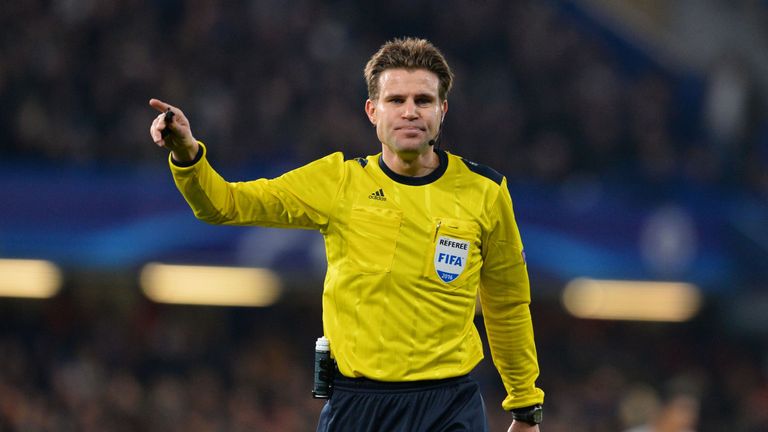 German referee Felix Brych officiates the UEFA Champions League round of 16 second leg football match between Chelsea and Paris Saint-Germain (PSG) at Stam