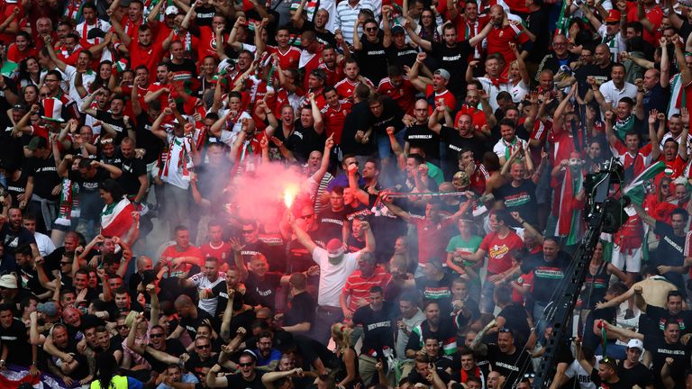 A flare is set off within the Hungary supporters during the UEFA Euro 2016 Group F match with Iceland in Marseille