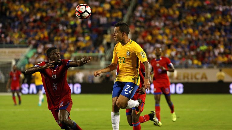 Philippe Coutinho and Romain Genevois Haiti fight for the ball