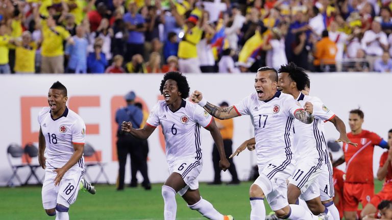 Colombia celebrate their overtime shootout  win against Peru during the Quarterfinal match of Copa America