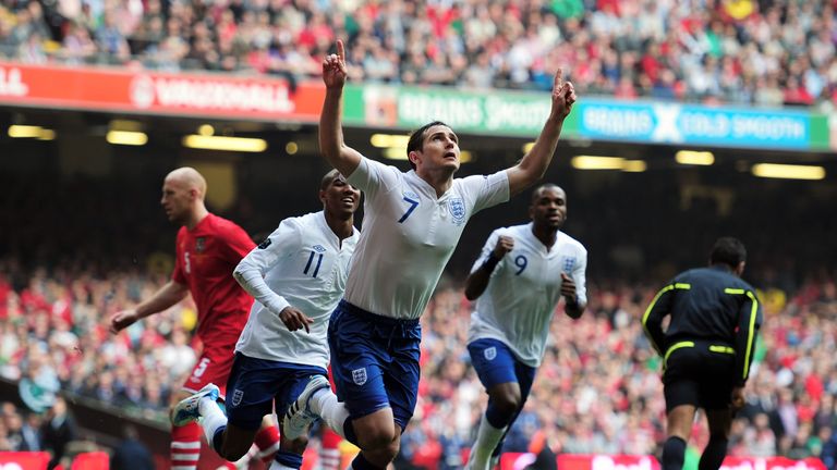 Frank Lampard of England celebrates after scoring the opening goal from the penalty spot against Wales in 2011