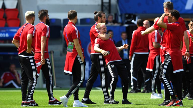 PARIS, FRANCE - JUNE 24:  Wales player Gareth Bale (l) and Jonny Williams share  a joke during Wales Open Session prior to their Euro 2016 match against No