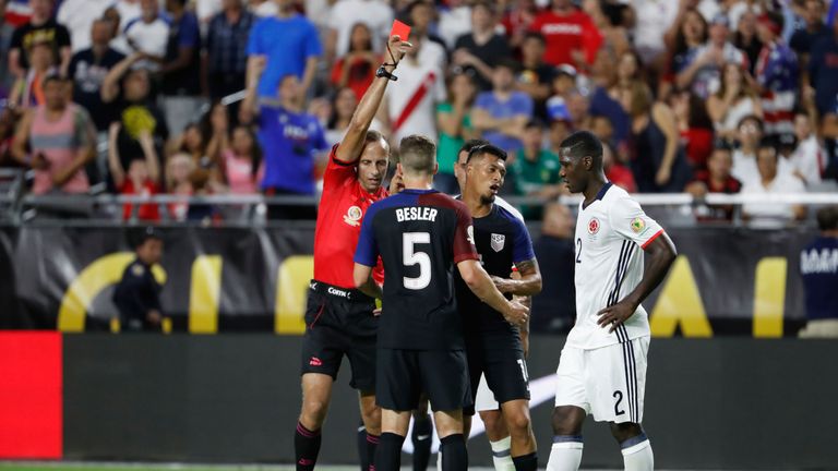 Michael Orozco of United States reacts to a second half red card 