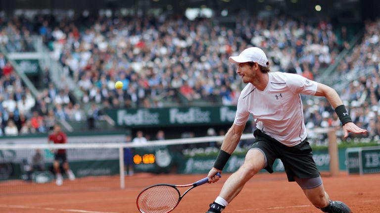 Britain's Andy Murray returns the ball to Serbia's Novak Djokovic