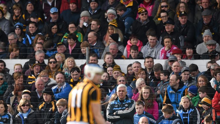 Ger Cunningham watches on as Kilkenny's TJ Reid lines up a free
