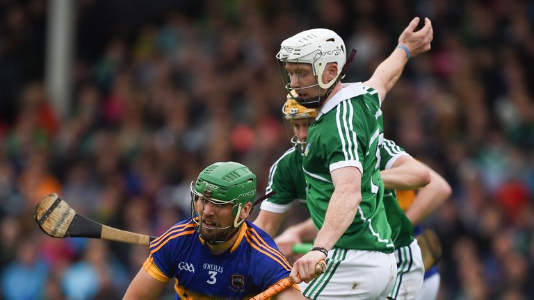 James Barry of Tipperary in action against Cian Lynch and Paul Browne of Limerick