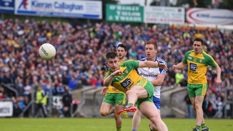 Paddy McBrearty scores a point against Monaghan