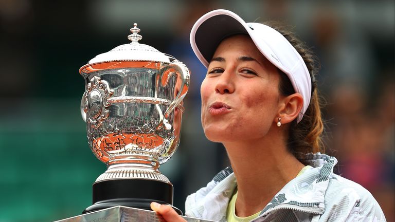 PARIS, FRANCE - JUNE 04:  Garbine Muguruza of Spain kisses the trophy following her victory during the Ladies Singles final match against Serena Williams o