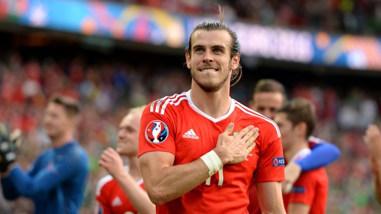Wales' Gareth Bale celebrates on the pitch after the round of 16 match at the Parc de Princes, Paris