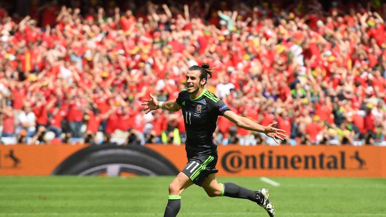 LENS, FRANCE - JUNE 16:  Gareth Bale of Wales celebrates after scoring the first goal during the UEFA EURO 2016 Group B match between England and Wales at 