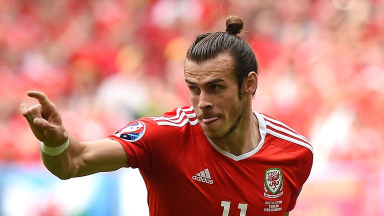 Wales' forward Gareth Bale celebrates after scoring the first goal during the Euro 2016 group B football match between Wales and Slovakia at the Stade de B
