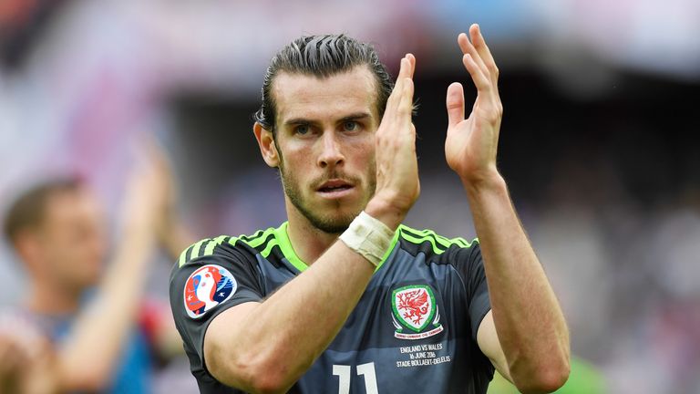 Gareth Bale of Wales applauds the supporters after his team's 1-2 defeat to England