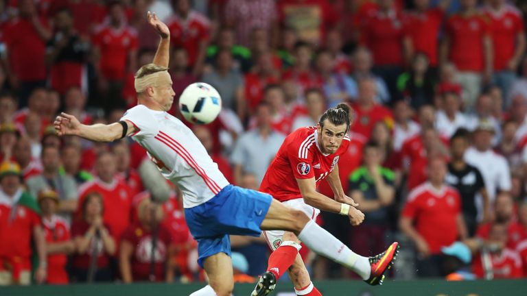Gareth Bale - scorer of Wales' third - shoots at goal against Russia in Toulouse