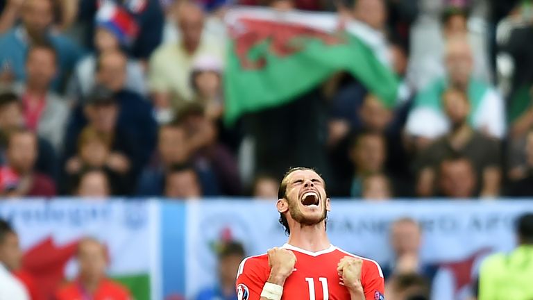 Wales' forward Gareth Bale reacts as Wales wins the Euro 2016 group B football match between Wales and Slovakia at the Stade de Bordeaux in Bordeaux on Jun