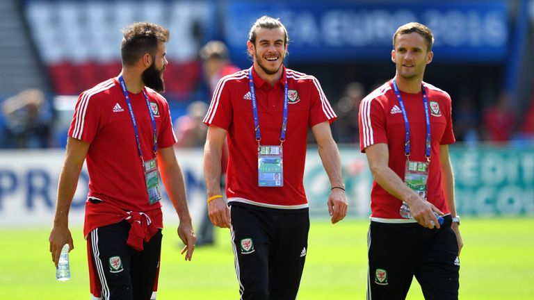 Wales players Joe Ledley (l) Gareth Bale (c) and Andy King share a joke