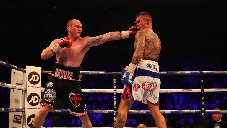 LONDON, ENGLAND - JUNE 25:  George Groves of Great Britain lands a punch on Martin Murray of Great Britainduring their WBA International Super-Middleweight