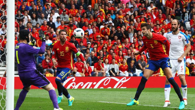 Gerard Pique heads the ball to score Spain's winner past Petr Cech as the Czech Republic are beaten