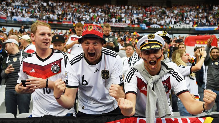 Germany fans enjoy the pre-match atmosphere before their team face Poland