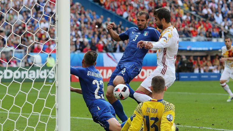 Giorgio Chiellini pounces to open the scoring for Italy against Spain