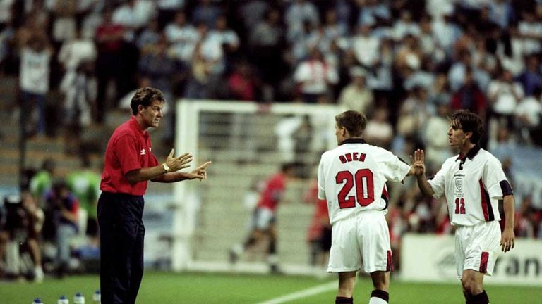 Michael Owen and Gary Neville of England receive instructions from Glenn Hoddle during the World Cup match against Argentina in 1998 