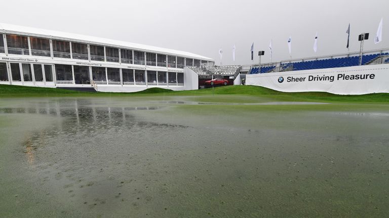 A general view of the flooded 18th green during the suspention of play during the third round of the BMW International Open