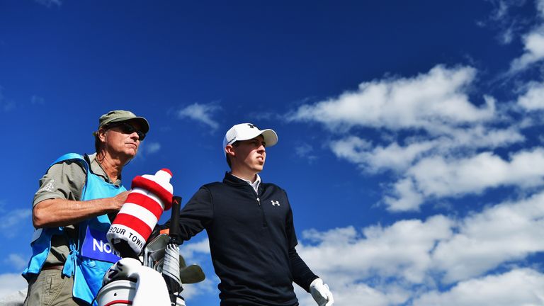 Matthew Fitzpatrick of England and caddie Lorne Duncan, ponder a shot during the final round of the Nordea Masters at Bro Hof Slott