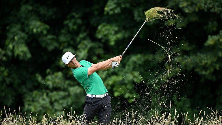 Thorbjorn Olesen of Denmark hits from the rough during the final round of the BMW International Open at Gut Larchenhof