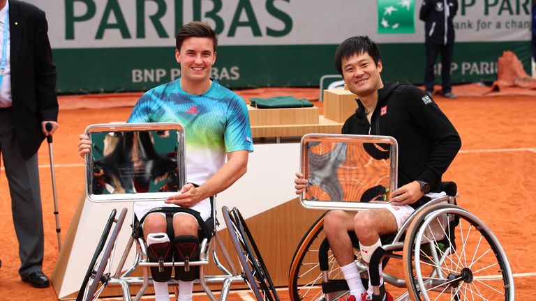 PARIS, FRANCE - JUNE 04:  Champions Gordon Reid of Great Britain and Shingo Kunieda of Japan pose with the trophies won in the Men's Wheelchair doubles fin