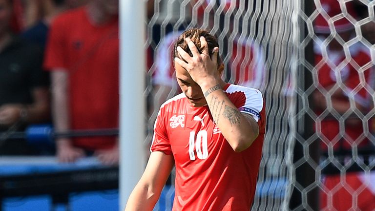 Granit Xhaka missed a penalty as Switzerland lost out to Poland in a penalty shoot-out